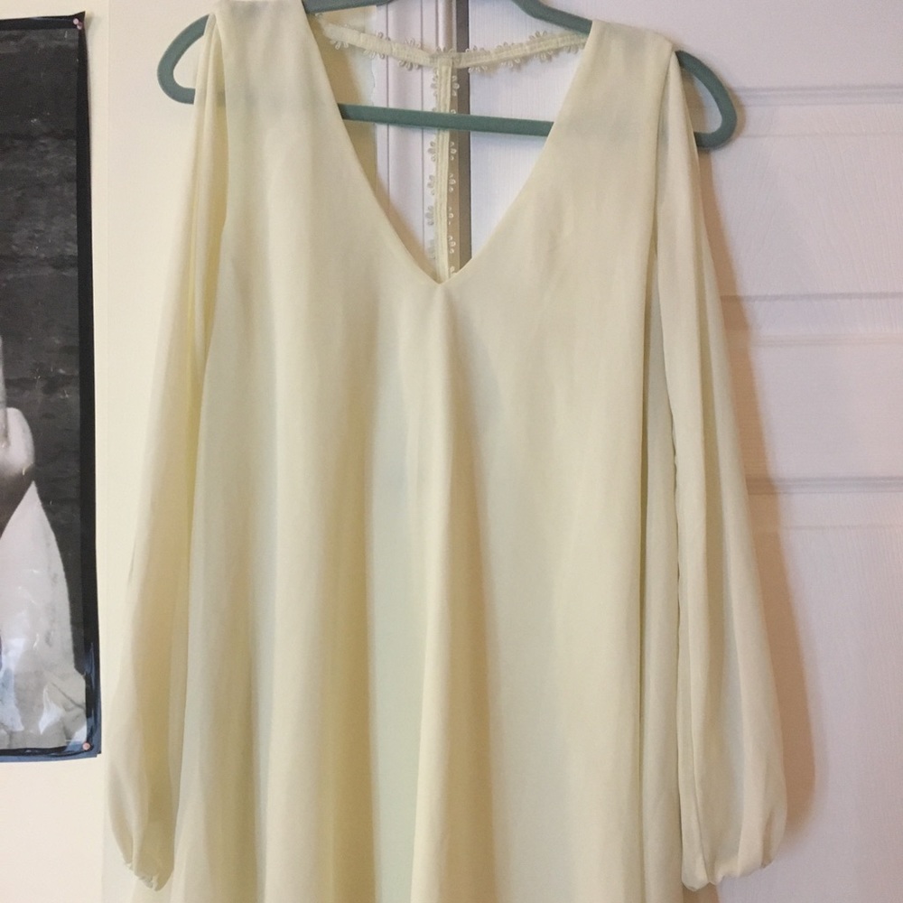 Ivory short dress with flower t-back design